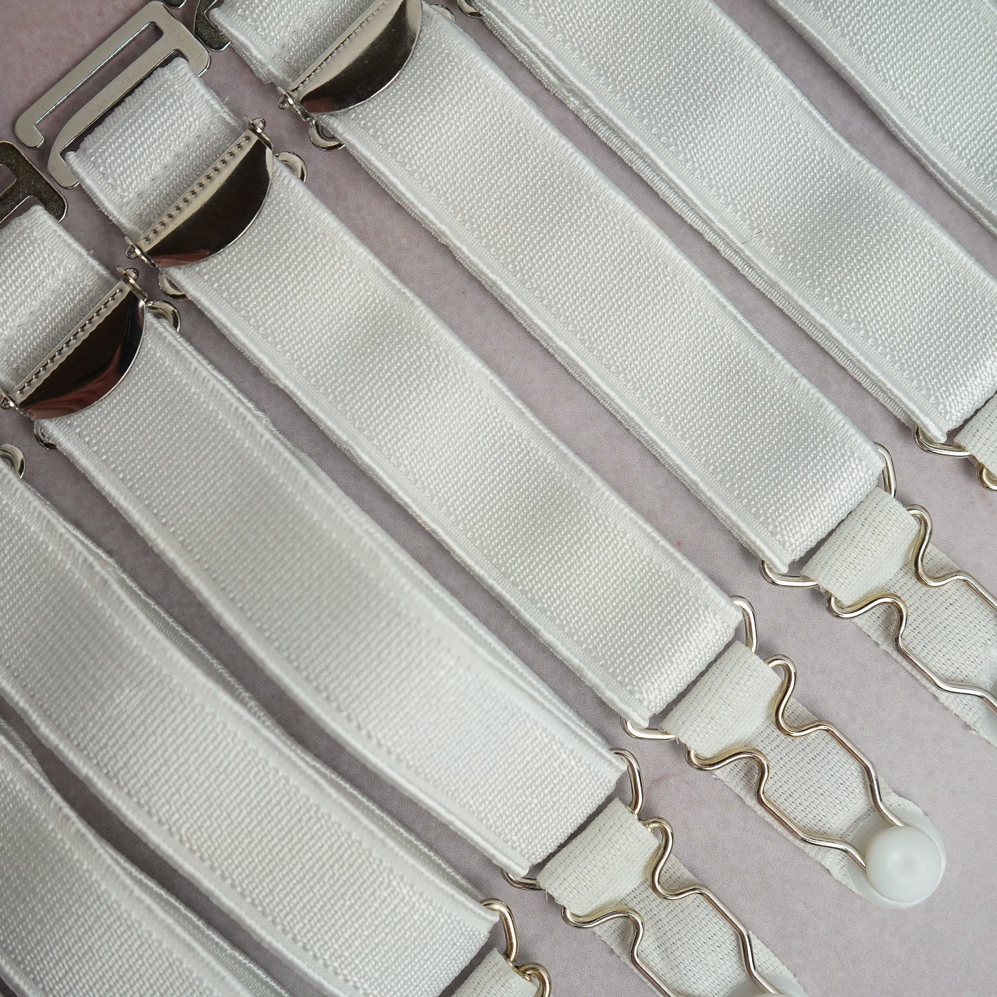 White hook on suspenders